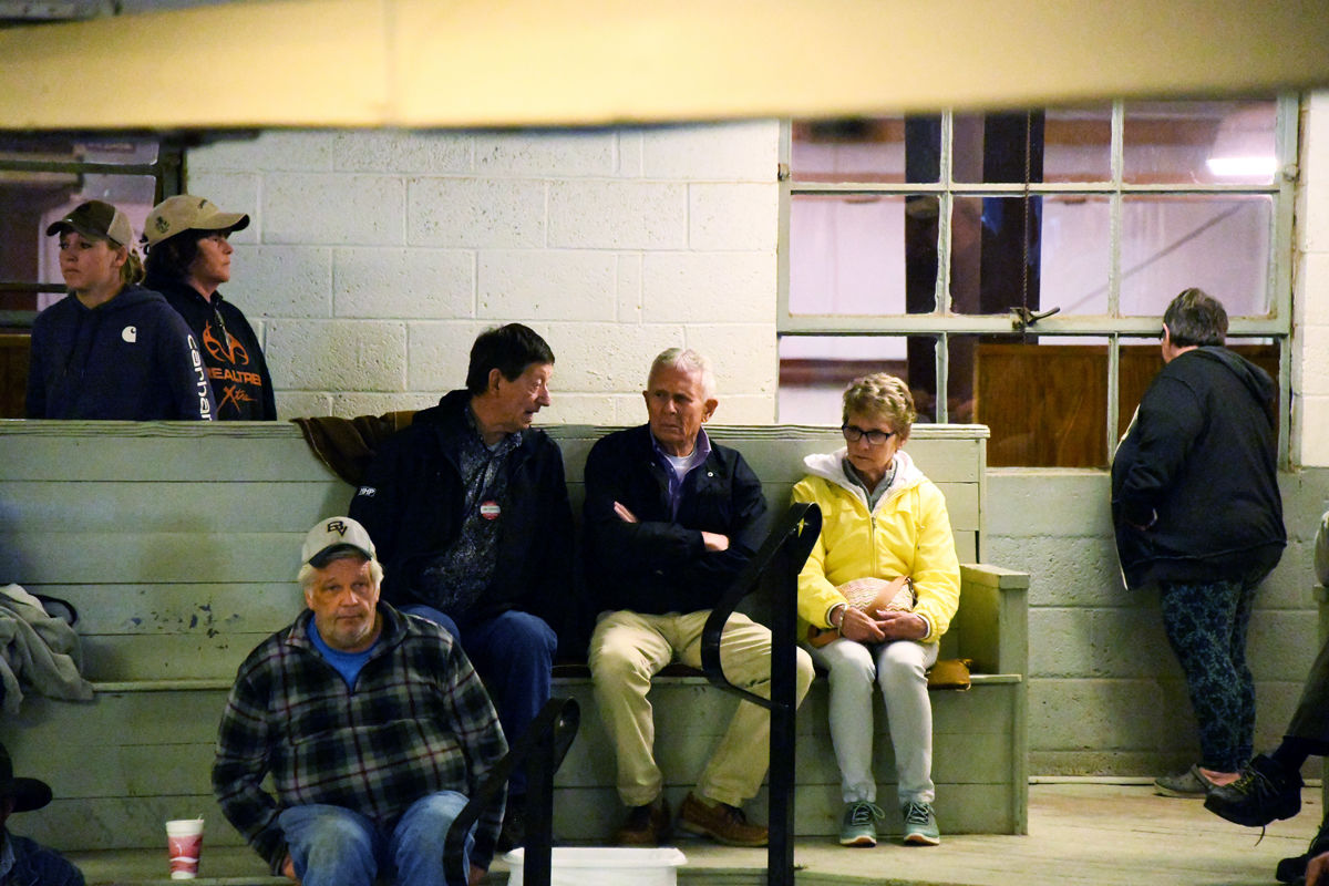 080 Jim Conner and Delmar and Sherry Peters watched the sheep auction at Kalona.JPG